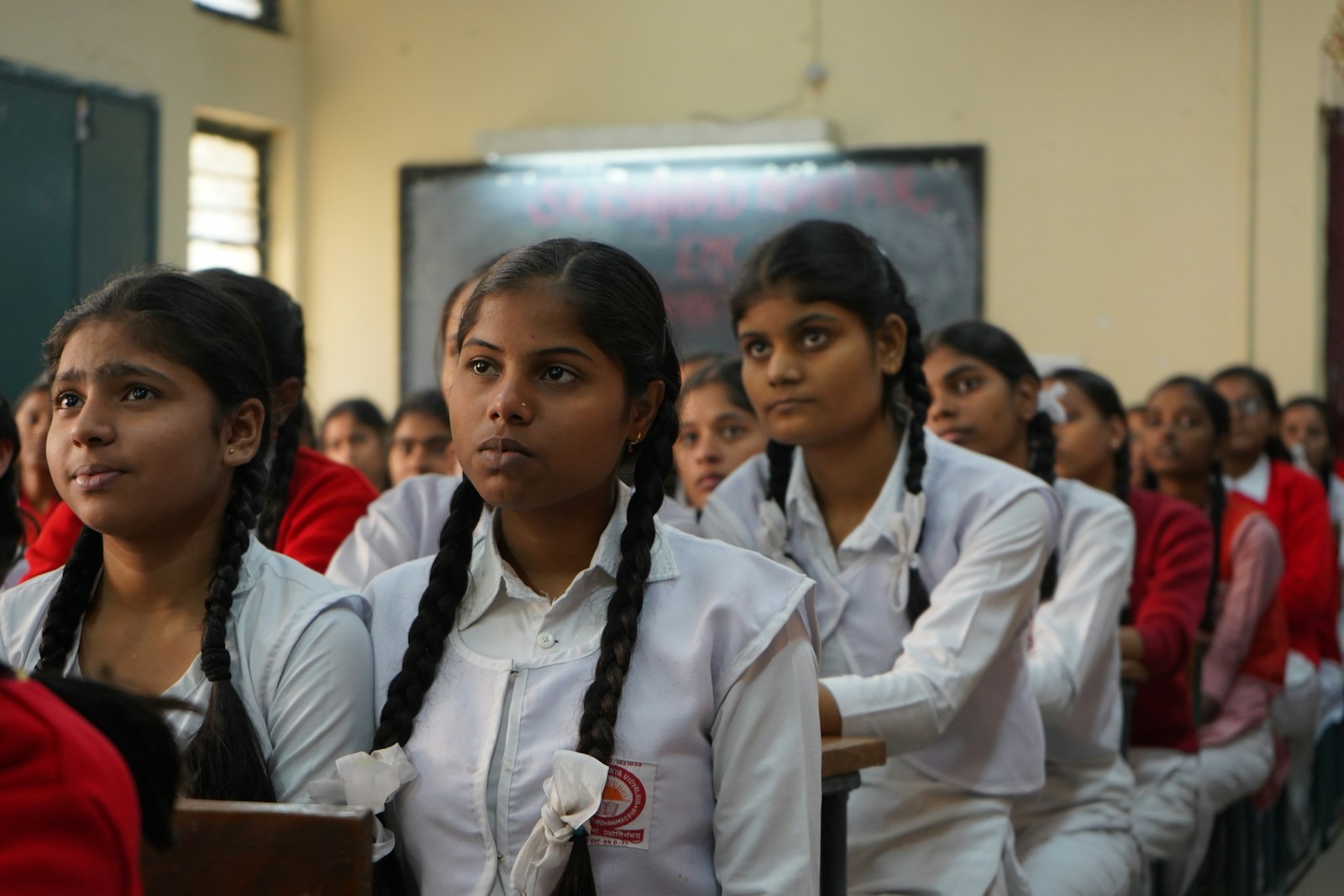 Representative classroom learning session with girls